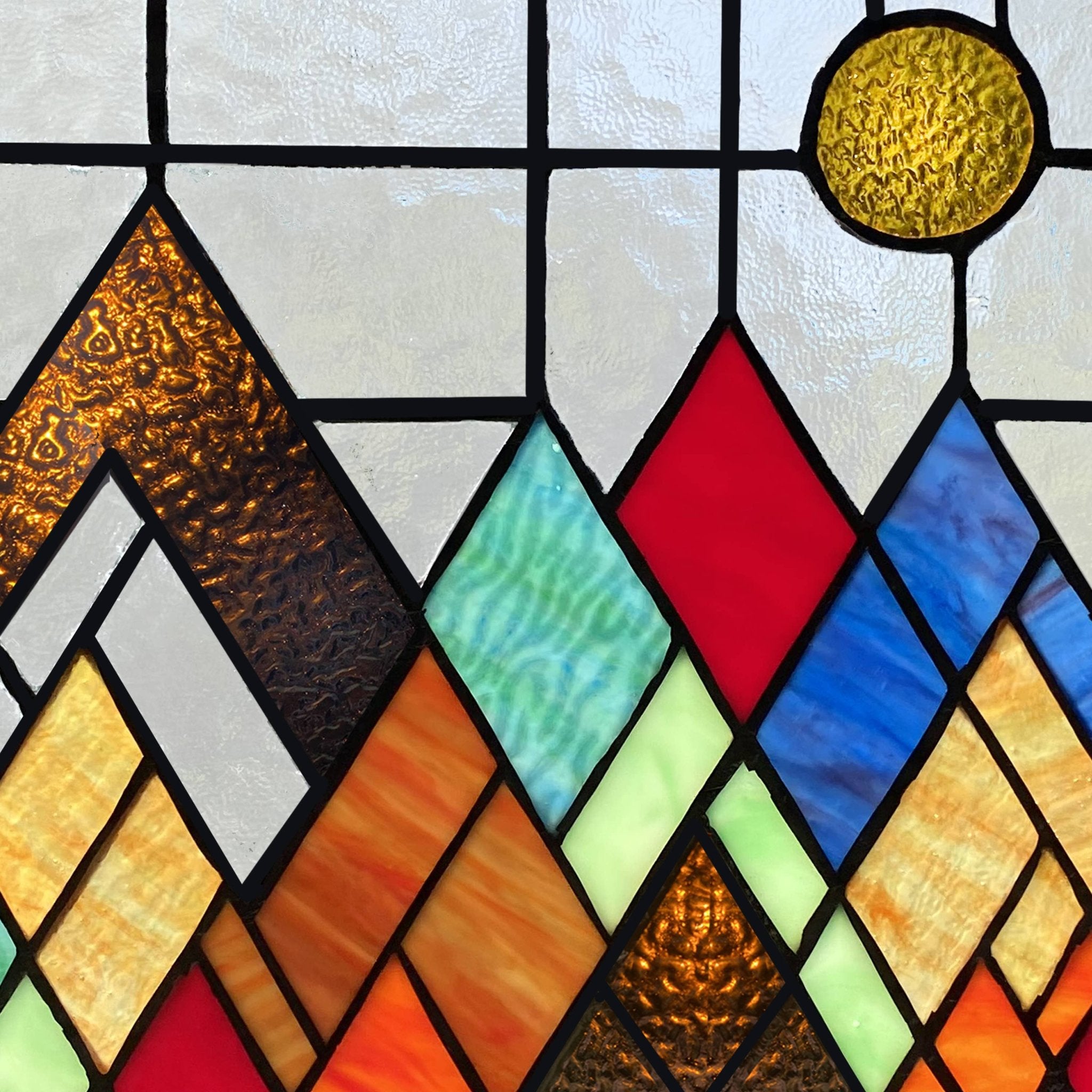10"H Beyond the Mountain Tops Multicolored Window Panel - Spiral Circle