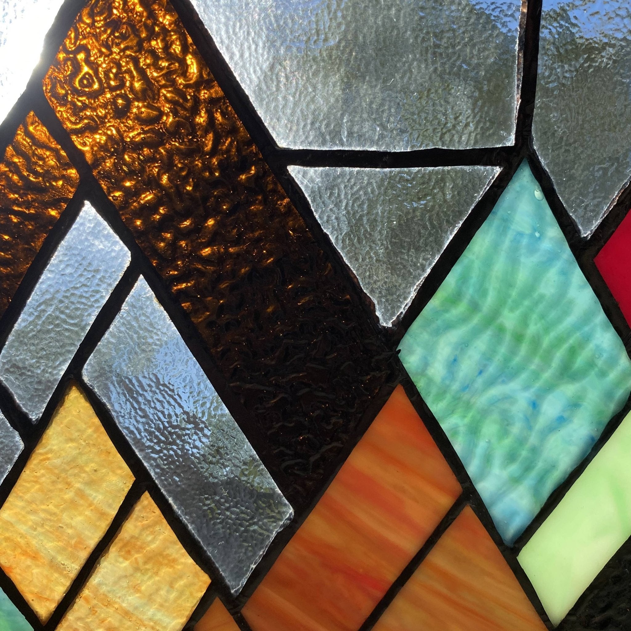 10"H Beyond the Mountain Tops Multicolored Window Panel - Spiral Circle