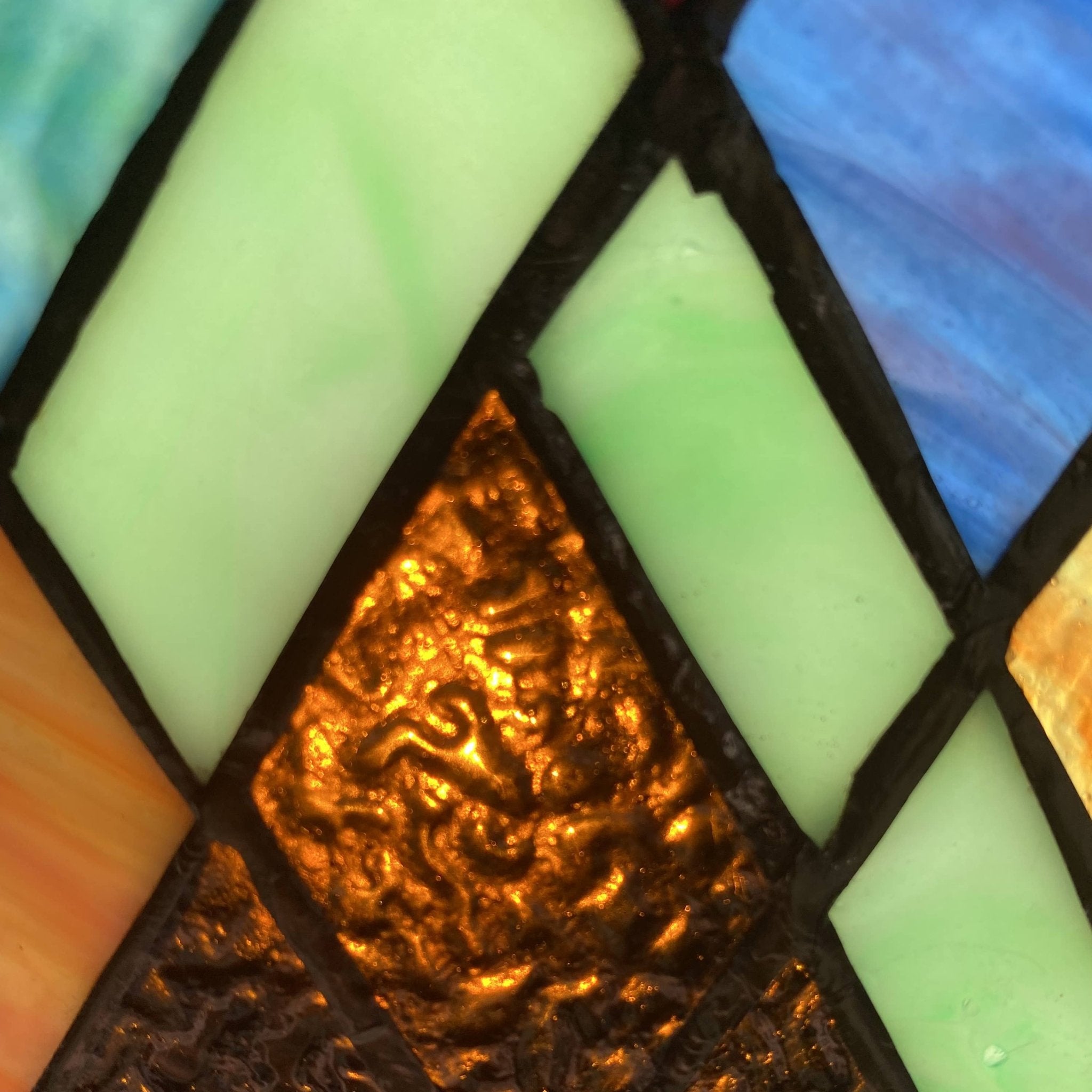 10"H Beyond the Mountain Tops Multicolored Window Panel - Spiral Circle