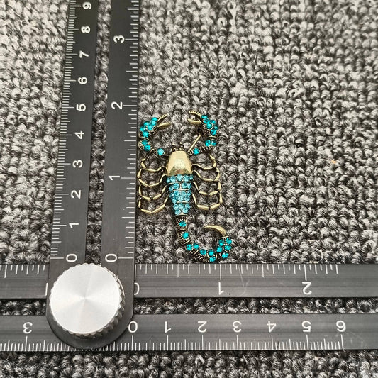Blue Cubic Zirconia Scorpion Brooch - Spiral Circle