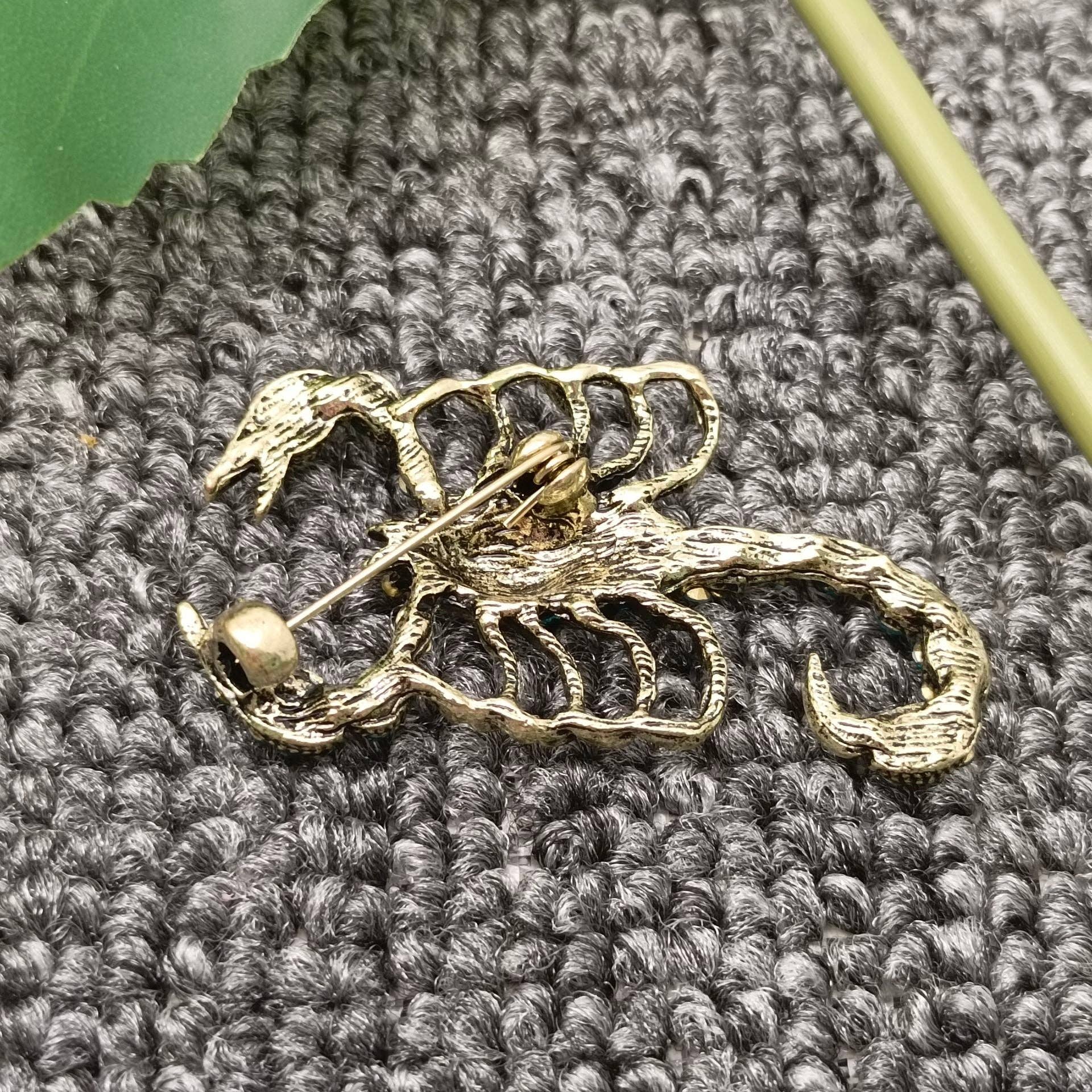 Blue Cubic Zirconia Scorpion Brooch - Spiral Circle