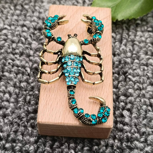 Blue Cubic Zirconia Scorpion Brooch - Spiral Circle