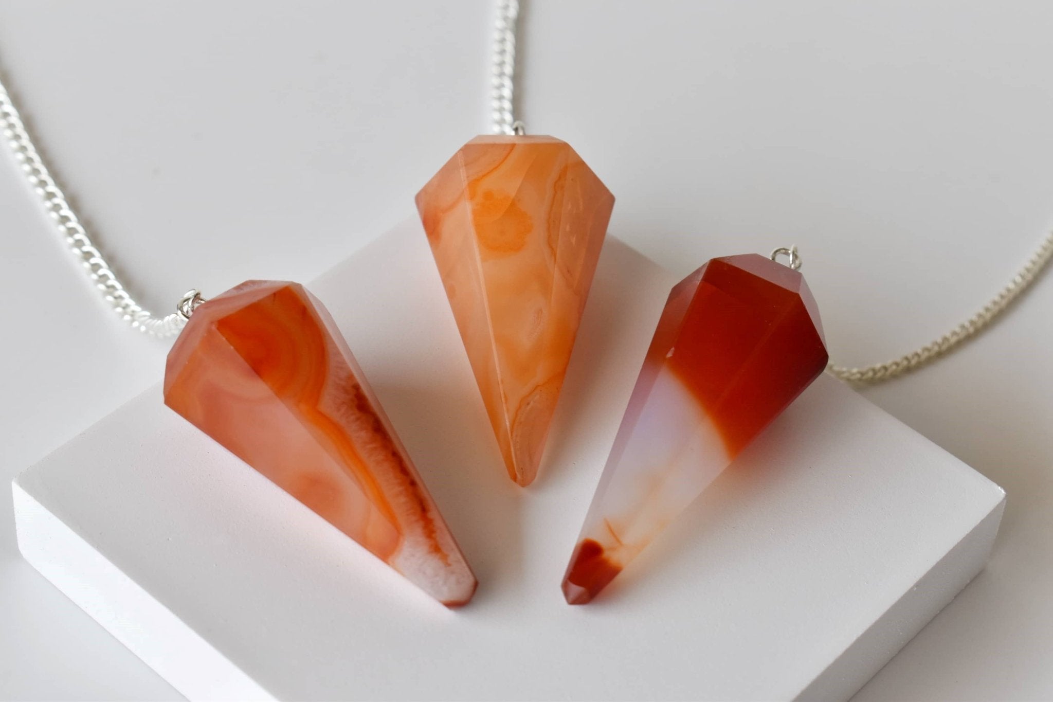 Dowsing Pendulum | Carnelian | Faceted Crystal Pendulum - Spiral Circle