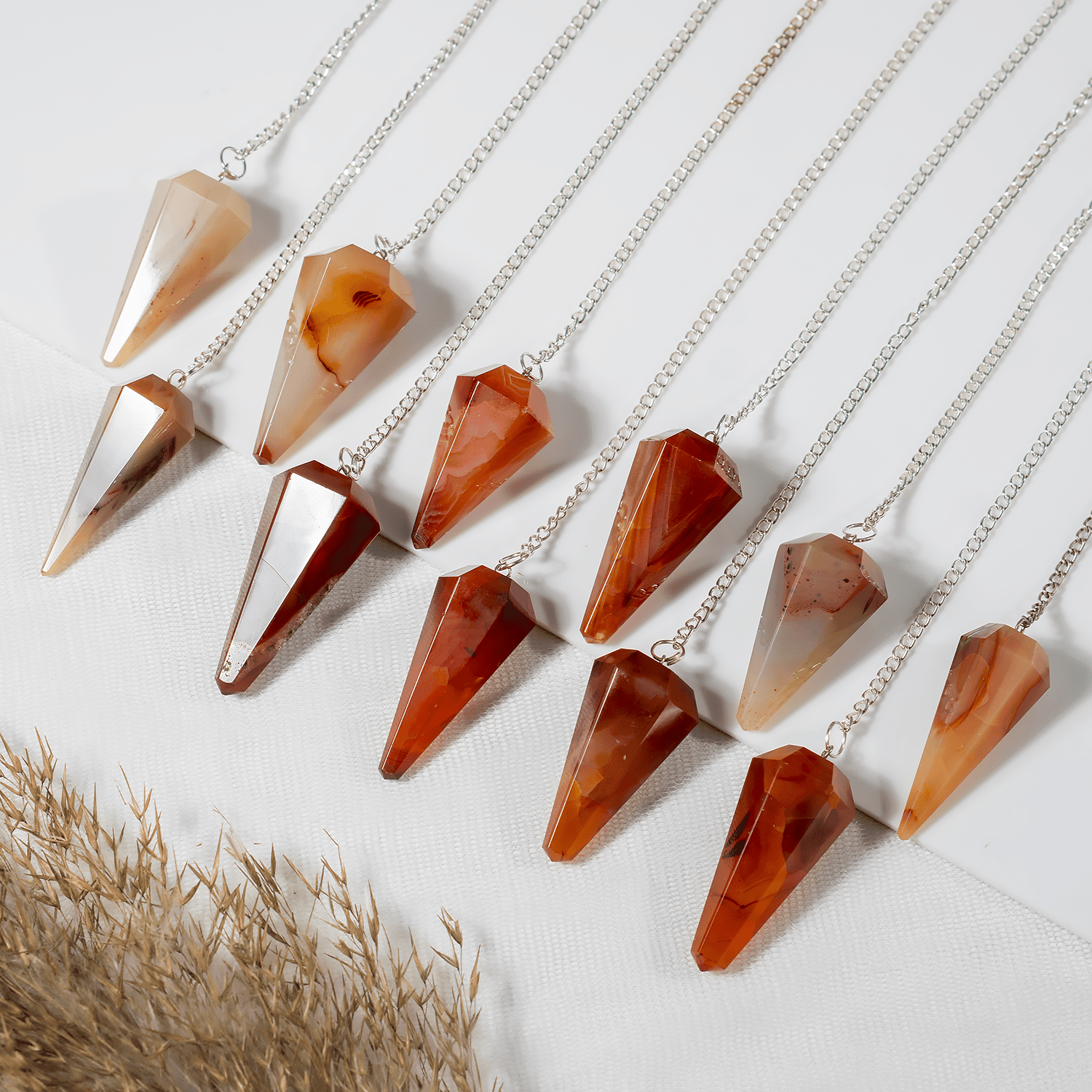 Dowsing Pendulum | Carnelian | Faceted Crystal Pendulum - Spiral Circle