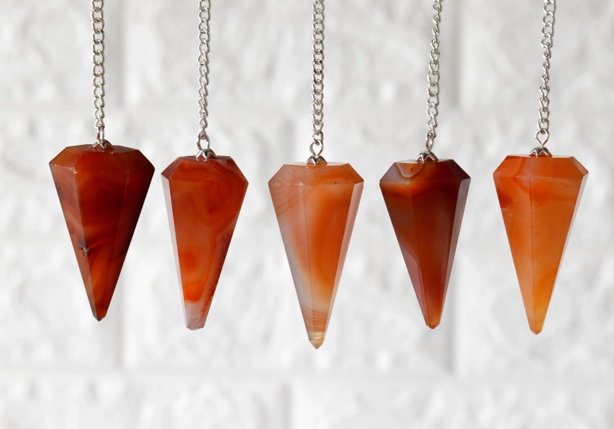 Dowsing Pendulum | Carnelian | Faceted Crystal Pendulum - Spiral Circle