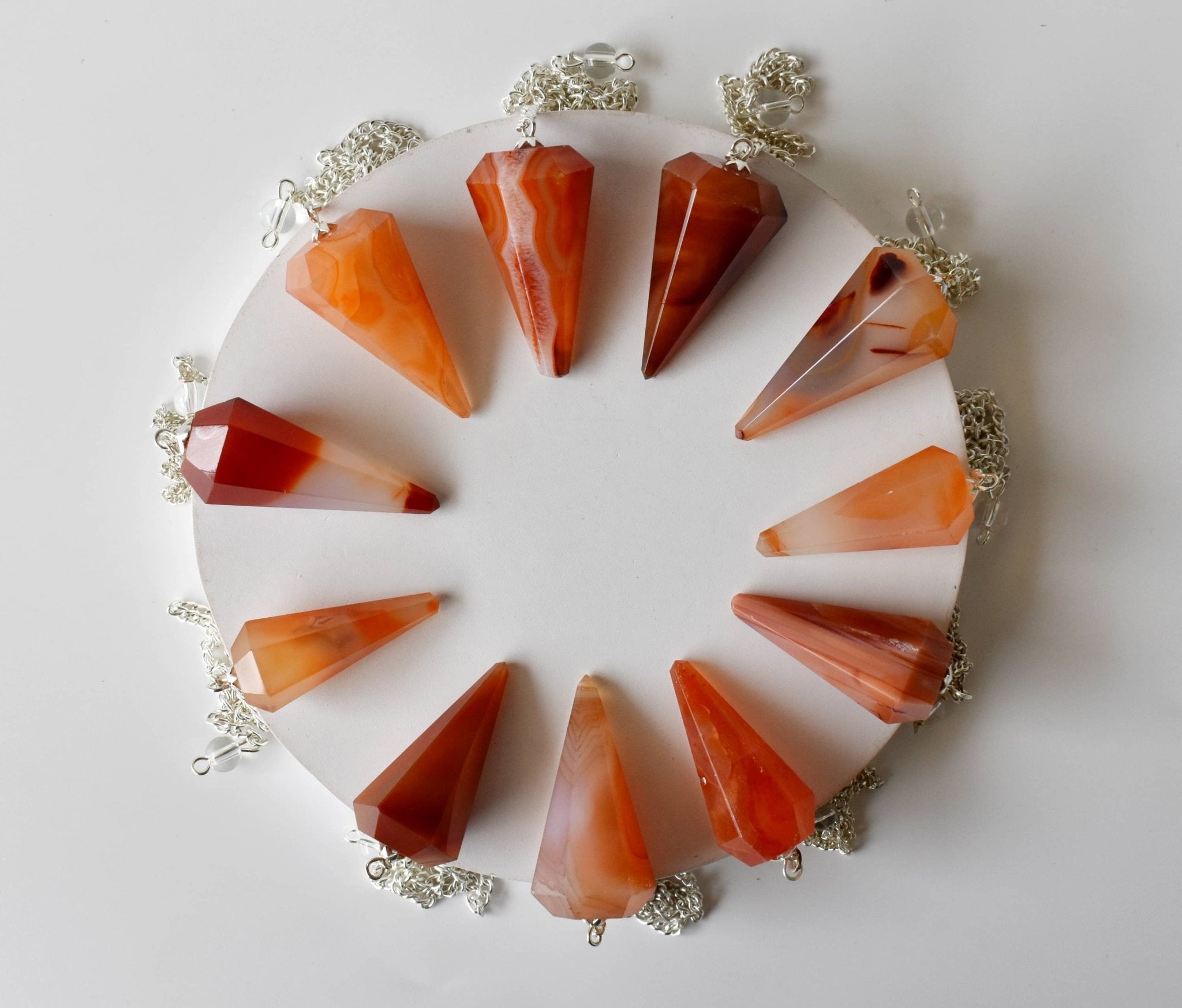 Dowsing Pendulum | Carnelian | Faceted Crystal Pendulum - Spiral Circle