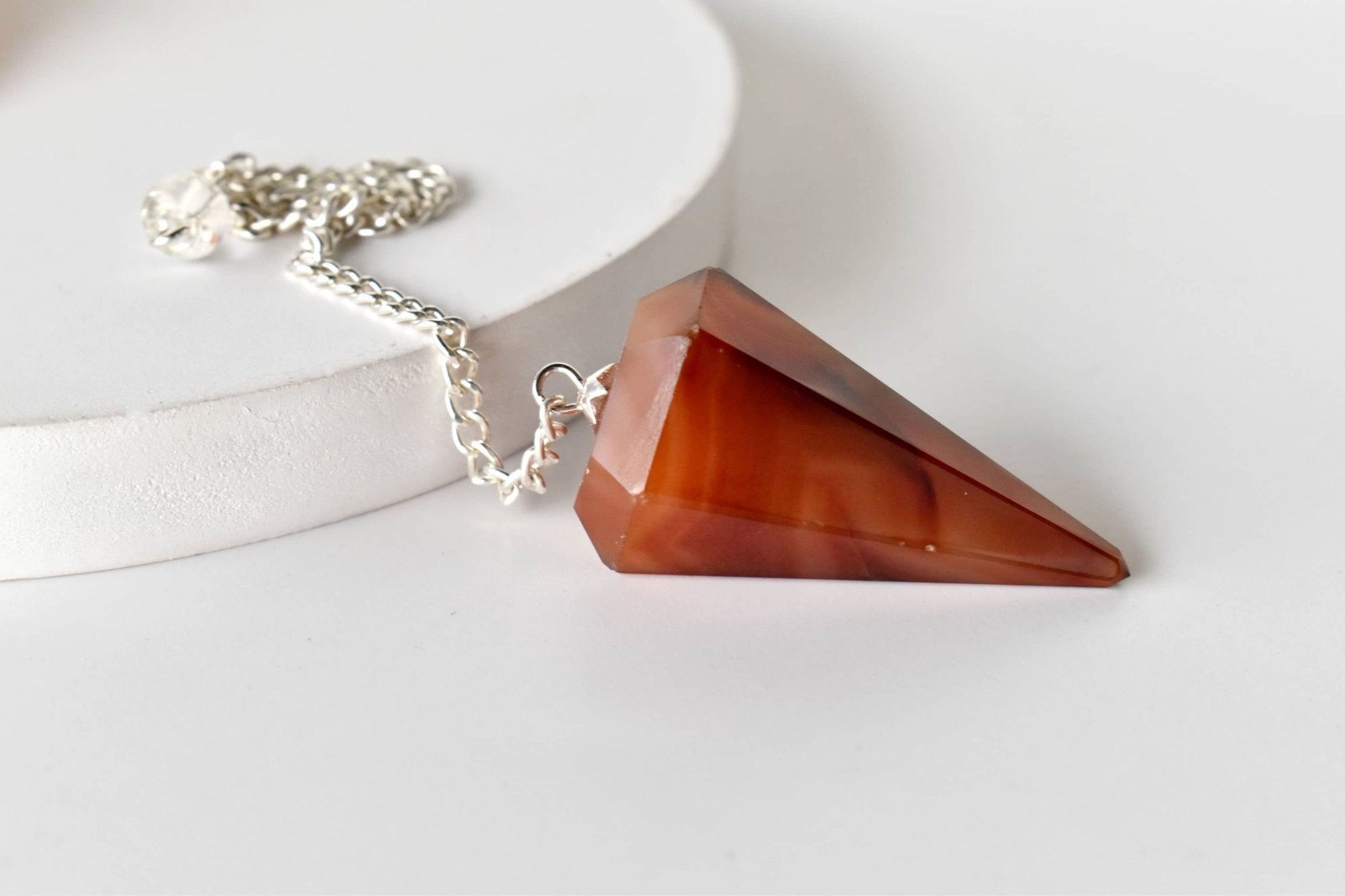 Dowsing Pendulum | Carnelian | Faceted Crystal Pendulum - Spiral Circle
