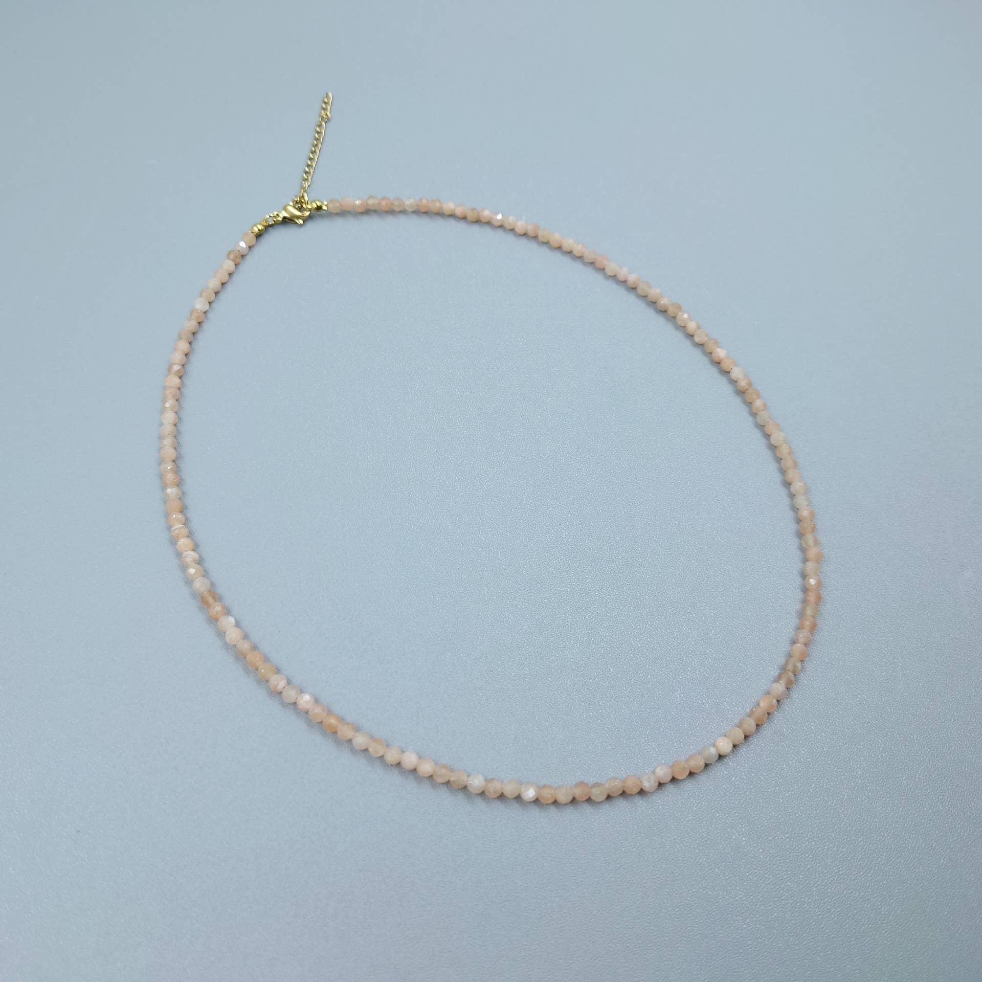 Elegant Gemstone Faceted Bead Necklace - Spiral Circle