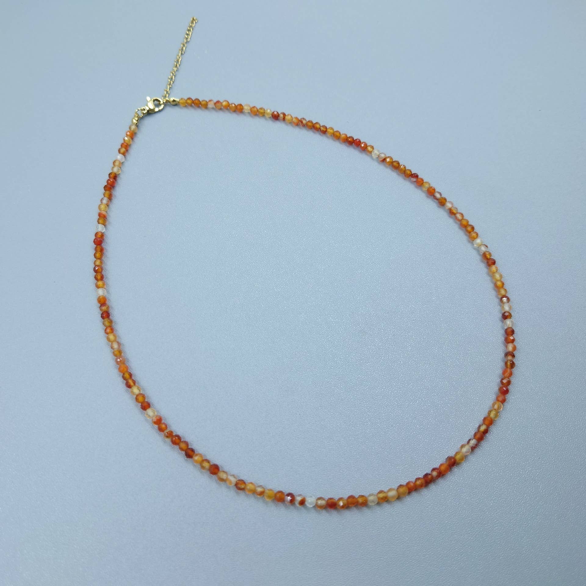 Elegant Gemstone Faceted Bead Necklace - Spiral Circle