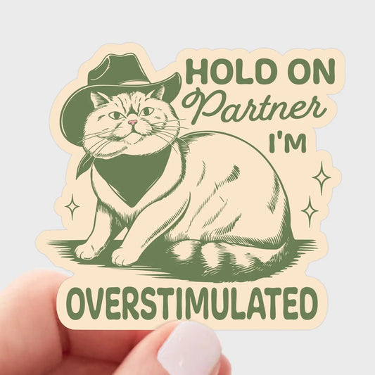 Hold On Partner I'm Overstimulated Sticker | Cat, Cowboy - Spiral Circle