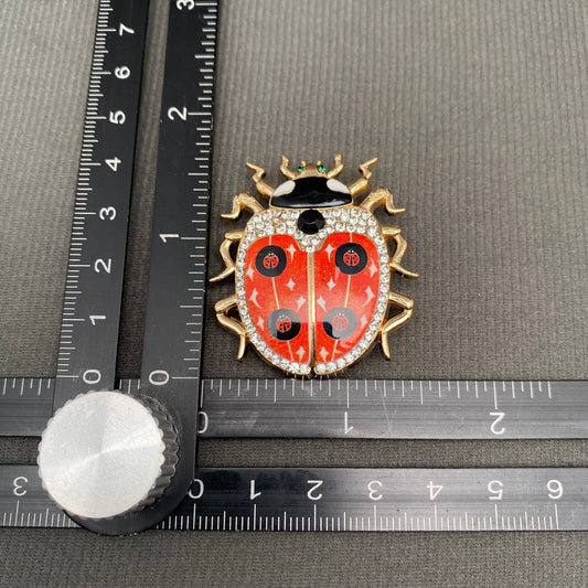 Rhinestone Inlaid Enamel Ladybug Brooch - Spiral Circle