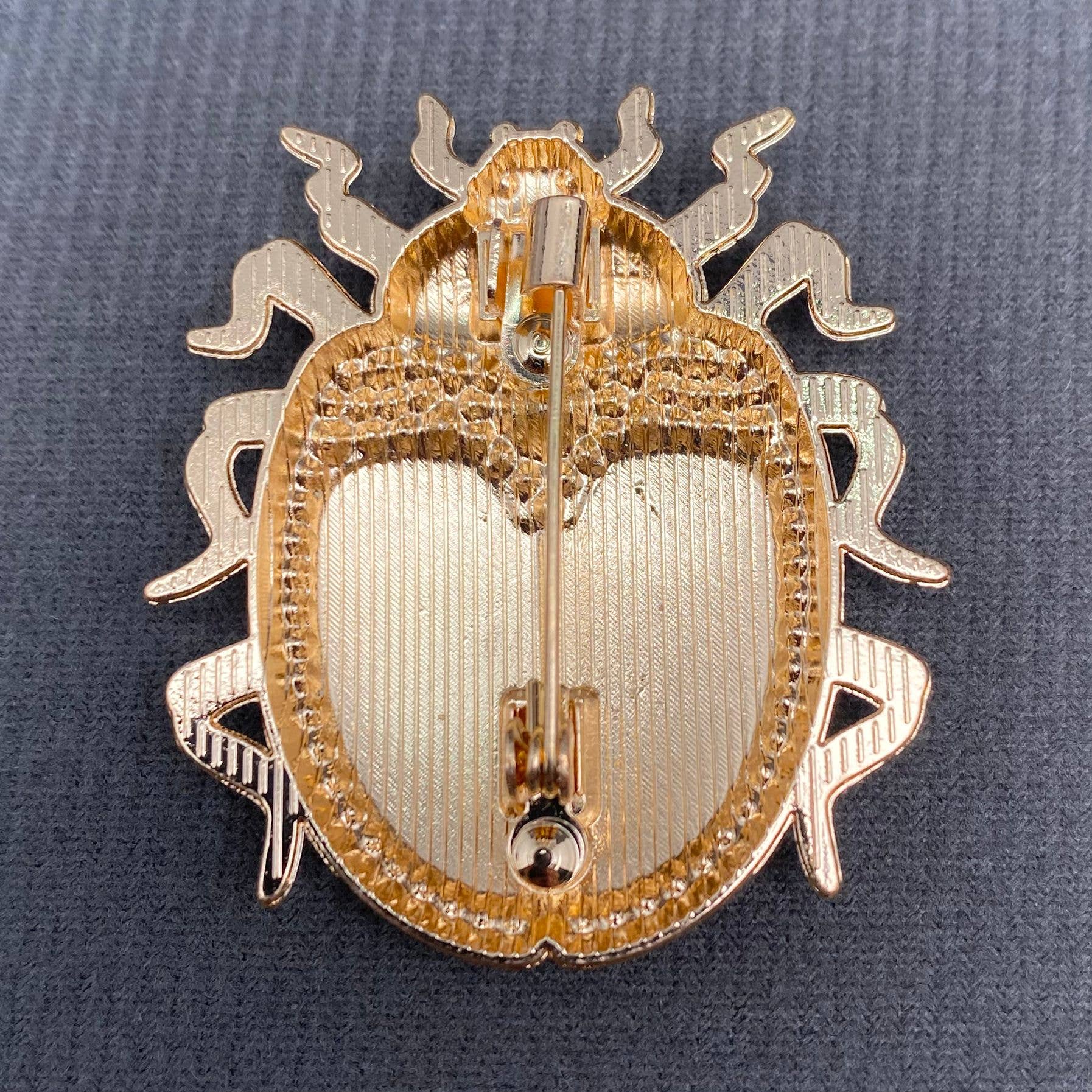 Rhinestone Inlaid Enamel Ladybug Brooch - Spiral Circle