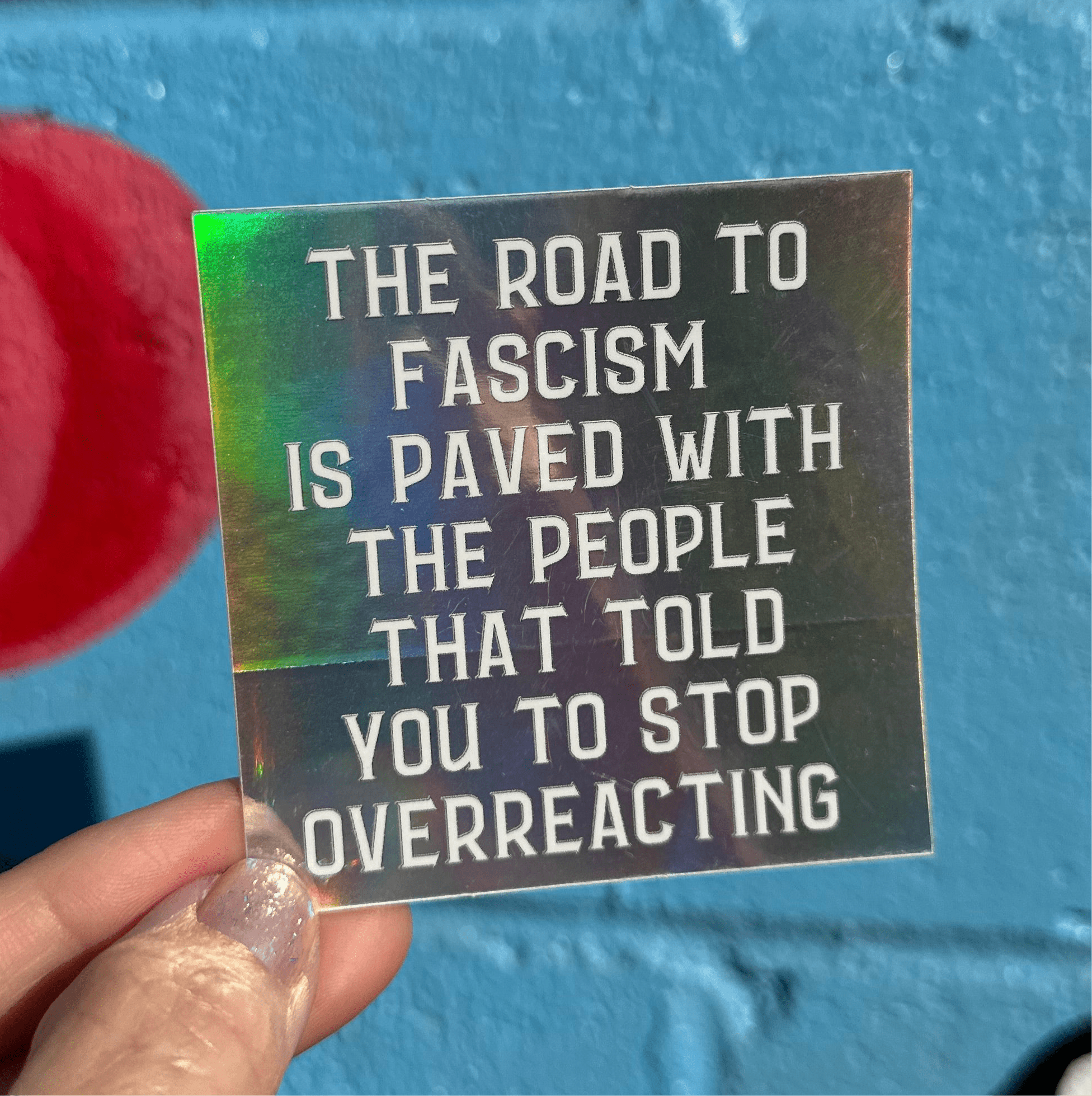 The Road To Fascism Is Paved With The People That Told You To Stop Overreacting Holographic Sticker - Spiral Circle