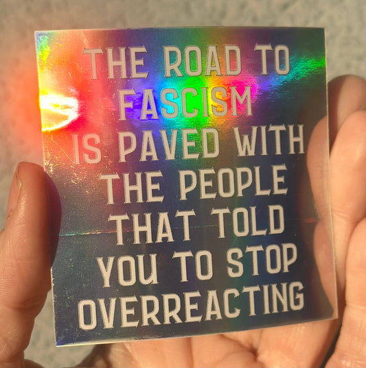 The Road To Fascism Is Paved With The People That Told You To Stop Overreacting Holographic Sticker - Spiral Circle