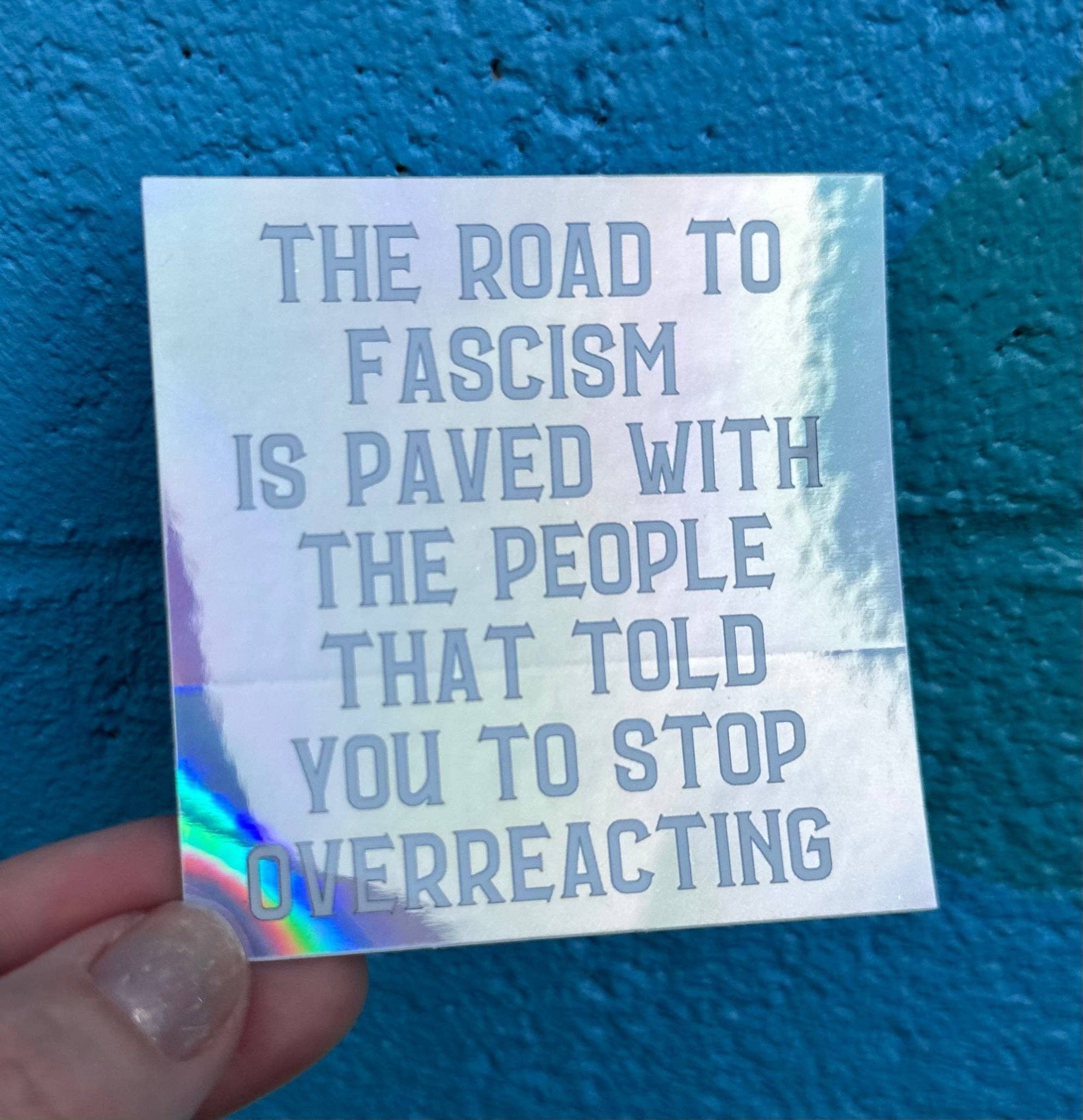 The Road To Fascism Is Paved With The People That Told You To Stop Overreacting Holographic Sticker - Spiral Circle