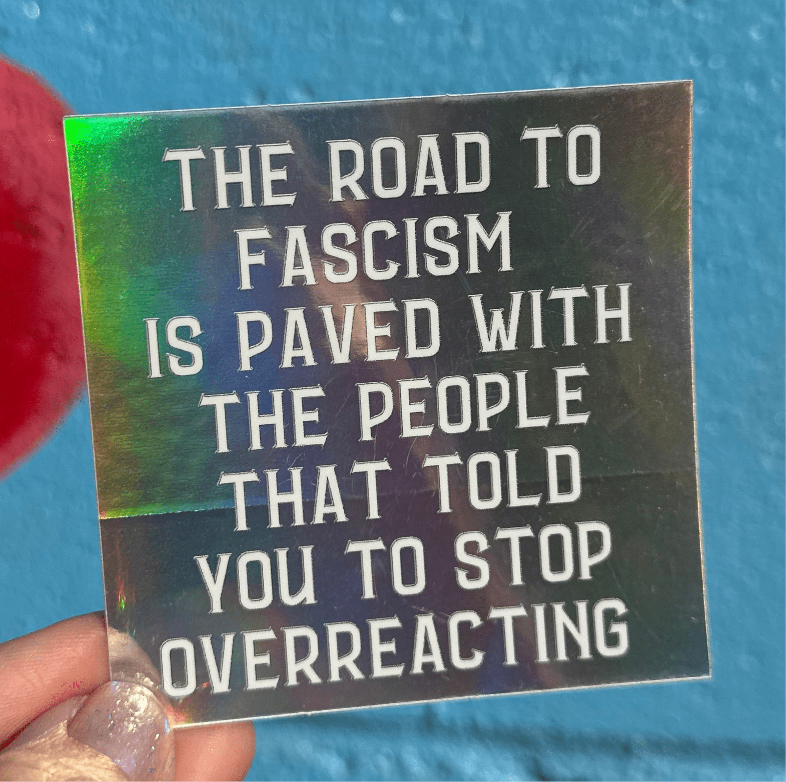 The Road To Fascism Is Paved With The People That Told You To Stop Overreacting Holographic Sticker - Spiral Circle
