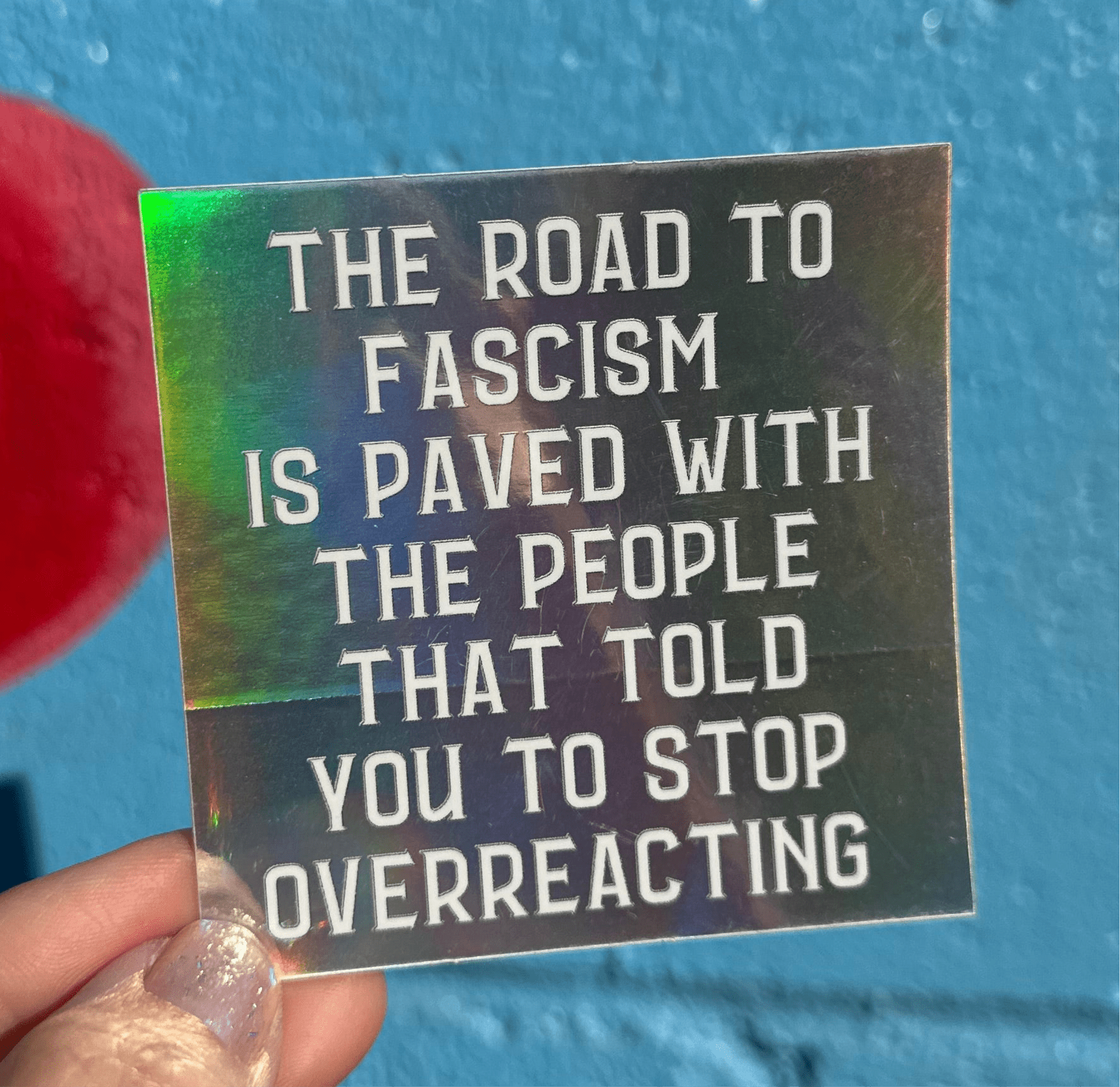 The Road To Fascism Is Paved With The People That Told You To Stop Overreacting Holographic Sticker - Spiral Circle