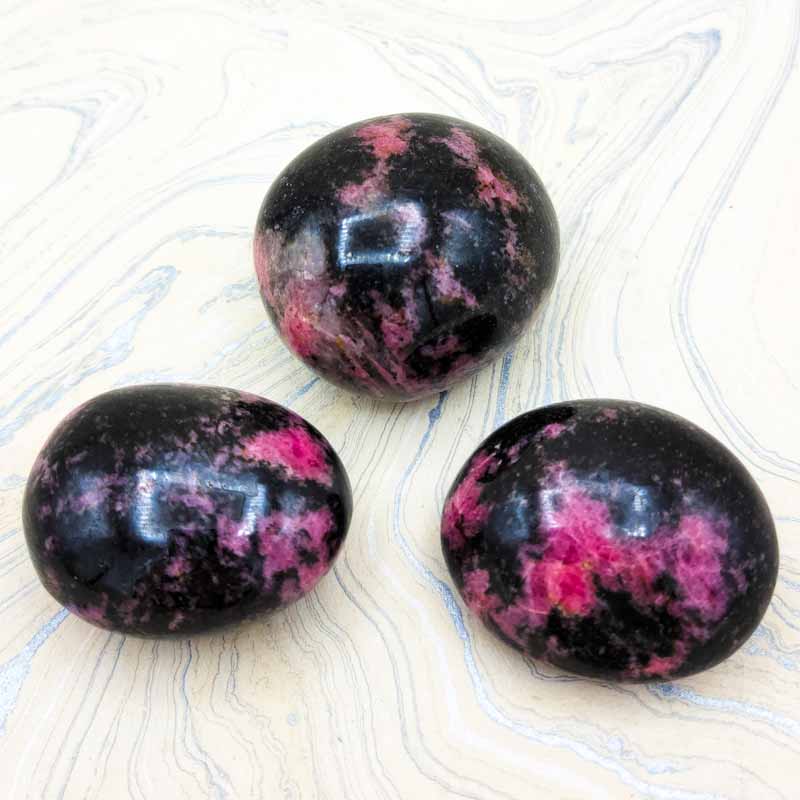 Rhodonite | Palm Stone - Spiral Circle