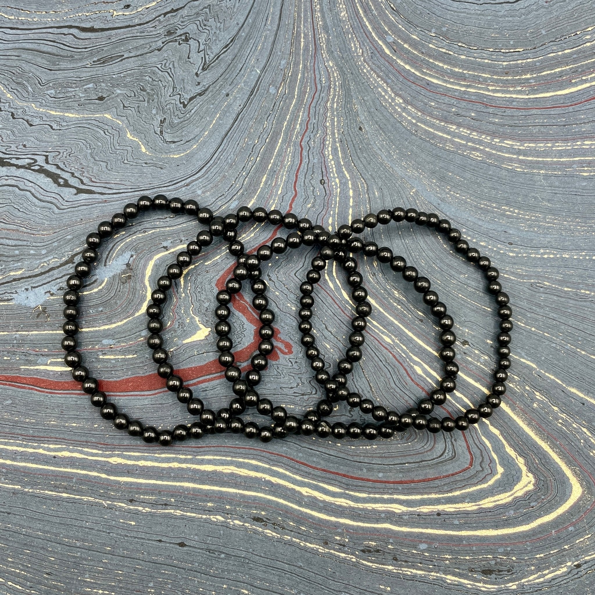 Shungite | Transformation and protection | Stone Beaded Bracelet | 4mm - Spiral Circle
