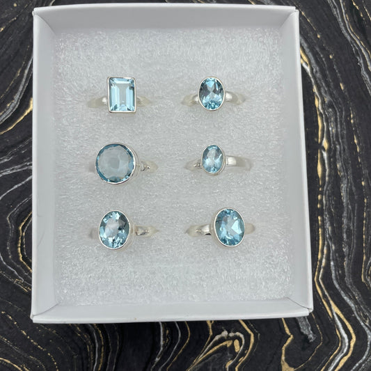 Sky Topaz Faceted Ring | Sterling Silver - Spiral Circle